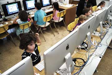 Students working with technology at school