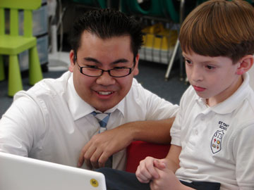 Students collaborating in a school technology program
